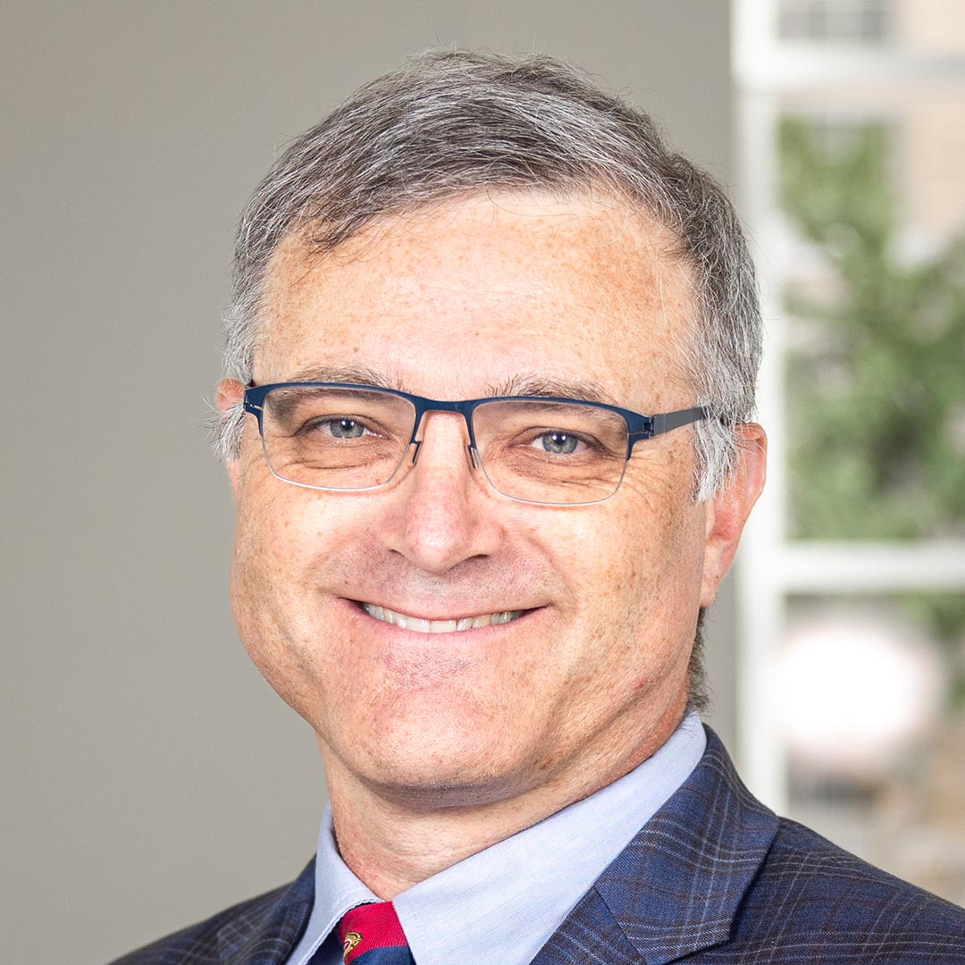 Professional headshot of Paul Wilson