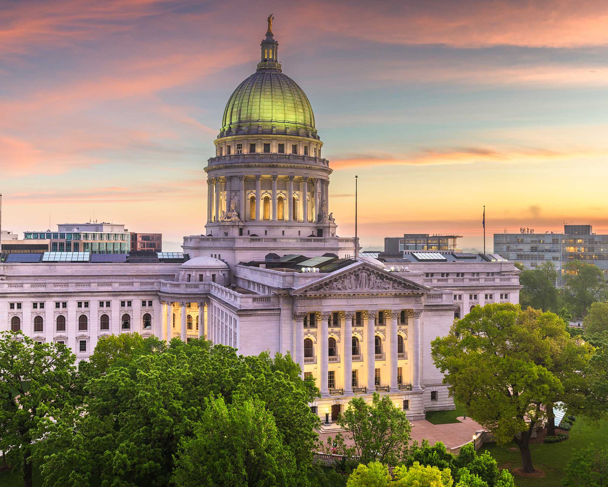 Madison, Wisconsin, USA cityscape over the state capitol building at twilight.